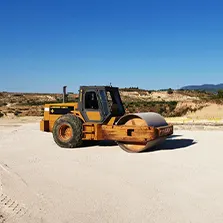 Apisonadora en explanada de Escombrera CH